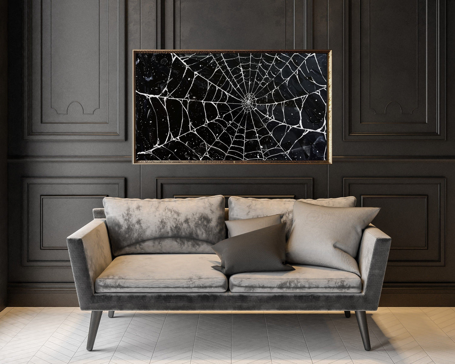 a living room with a couch and a painting on the wall