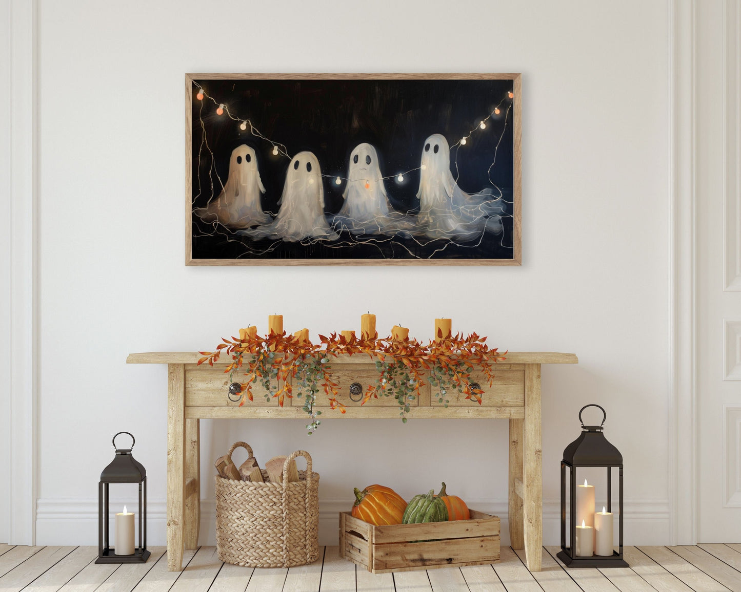 a painting of three ghostes on a table with pumpkins