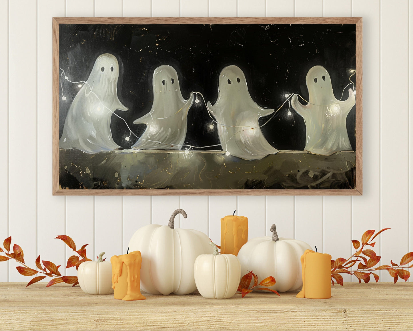 a painting of three ghost on a table with pumpkins